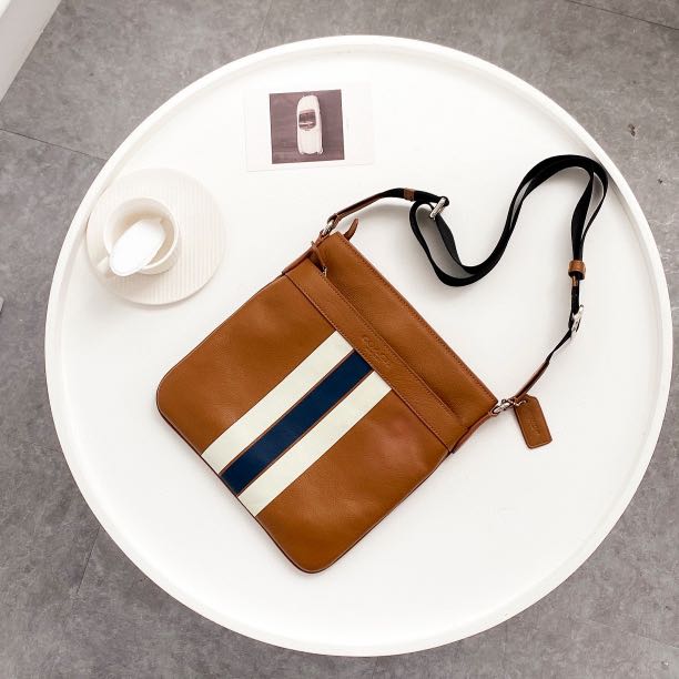 Coach charles crossbody with varsity stripe store