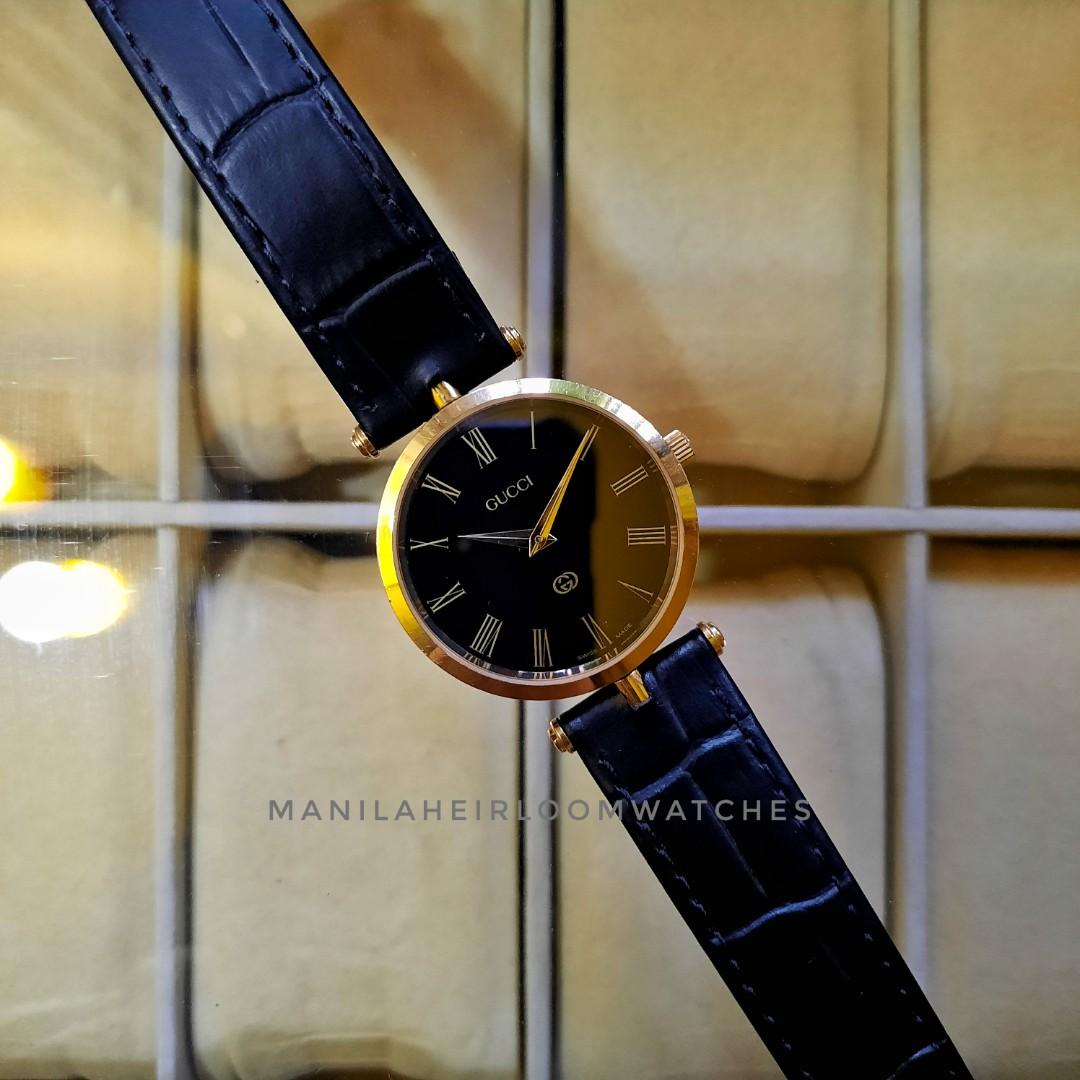 Gucci roman discount numeral watch