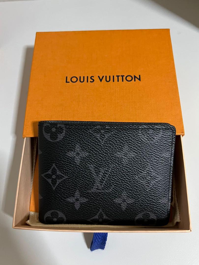Louis Vuitton Wallet (Mens Preowned Embossed Monogram LV Logo