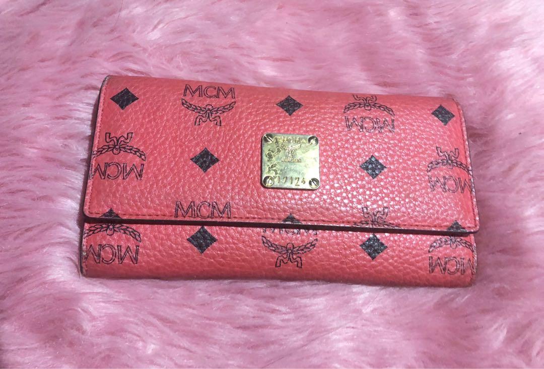 Mcm long wallet (Category: Luxury Bags & Wallets) located in Norzagaray. Submitted by ravenglamshop (Listing ID 1121749343, Image 1). Description: Original MCM long wallet Used Made in Korea With code Dirty coin compartment Minimal scratches Fading in gold hardware.