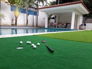Mini Golf area with 2 holes and Tennis Lawn