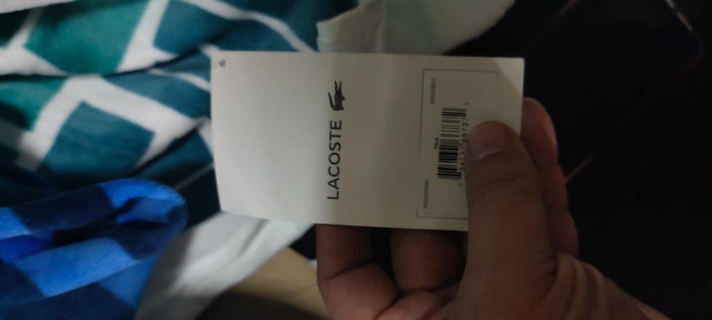 LACOSTE GRADIENT GEOMETRIC COTTON BEACH TOWEL (Category: Bedding & Towels) located in Valenzuela. Submitted by francissilva5667 (Listing ID 1121984270, Image 2). Description: Stay comfortable and stylish while you soak up some sun with the help of this super-soft cotton beach towel from Lacoste, featuring a gradient geometric pattern with croc logo accents and an absorbent terry cloth reverse. Dimensions: 36" x 72" Soft cotton velvet on the face,
