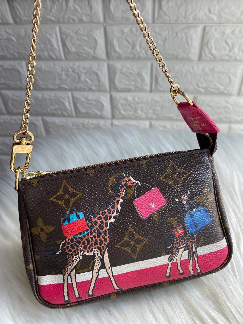 Louis Vuitton Mini Pochette Limited Christmas Edition Giraffe