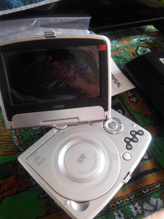 Coby Dvd Player For Sale (Category: Portable Audio Accessories) located in Manila. Submitted by rionava (Listing ID 1122296383, Image 2). Description: For sale coby dvd player 7 TFt portable dvd player with swivel screen rotates 180° 16.9 widescreen for details and other inquiries just contact the seller at 09363585485. .