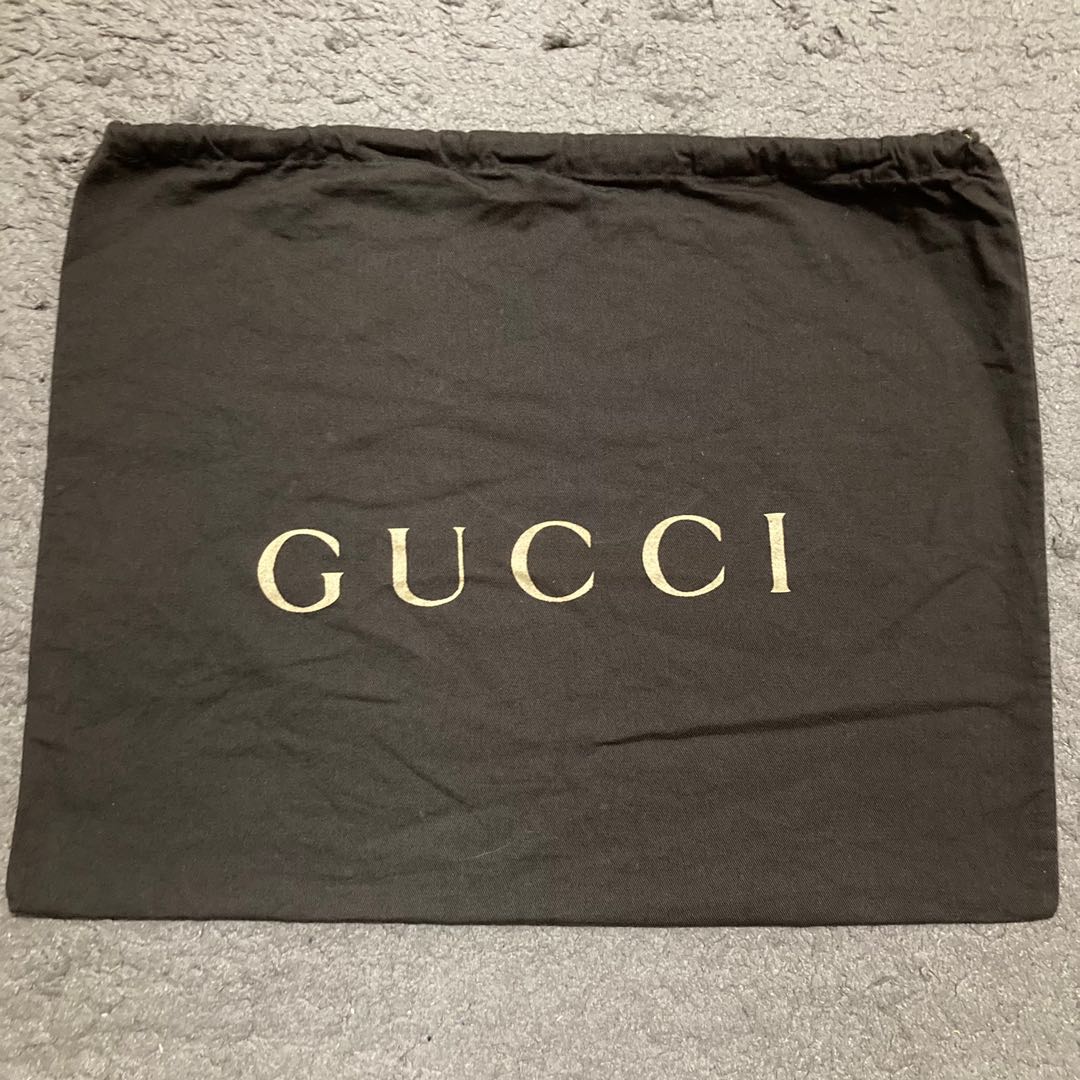 black gucci dust bag