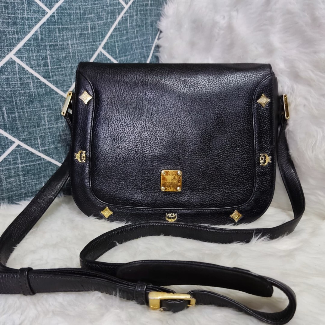 Mcm black store sling bag
