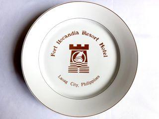 Souvenir plate from Fort Ilocandia Resort Hotel, porcelain with gold-lined rim, 10.5 in. diameter x 1.25 in H, never used