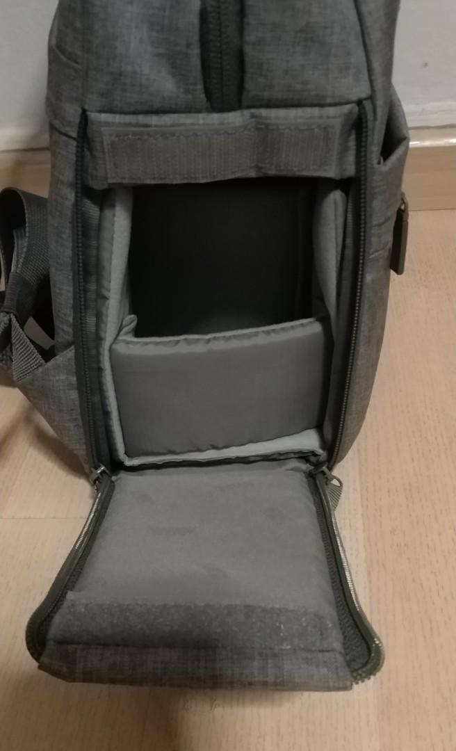 Camera Backbag (Category: Camera Bags & Carriers) located in Singapore. Submitted by kwan_2015 (Listing ID 1122474801, Image 4). Description: Perfect for camera & accessories, include 14" PC. Two air chamber penetration structure. Double-sided camera storage slot. Adjustable partition plate. Water-resistant..