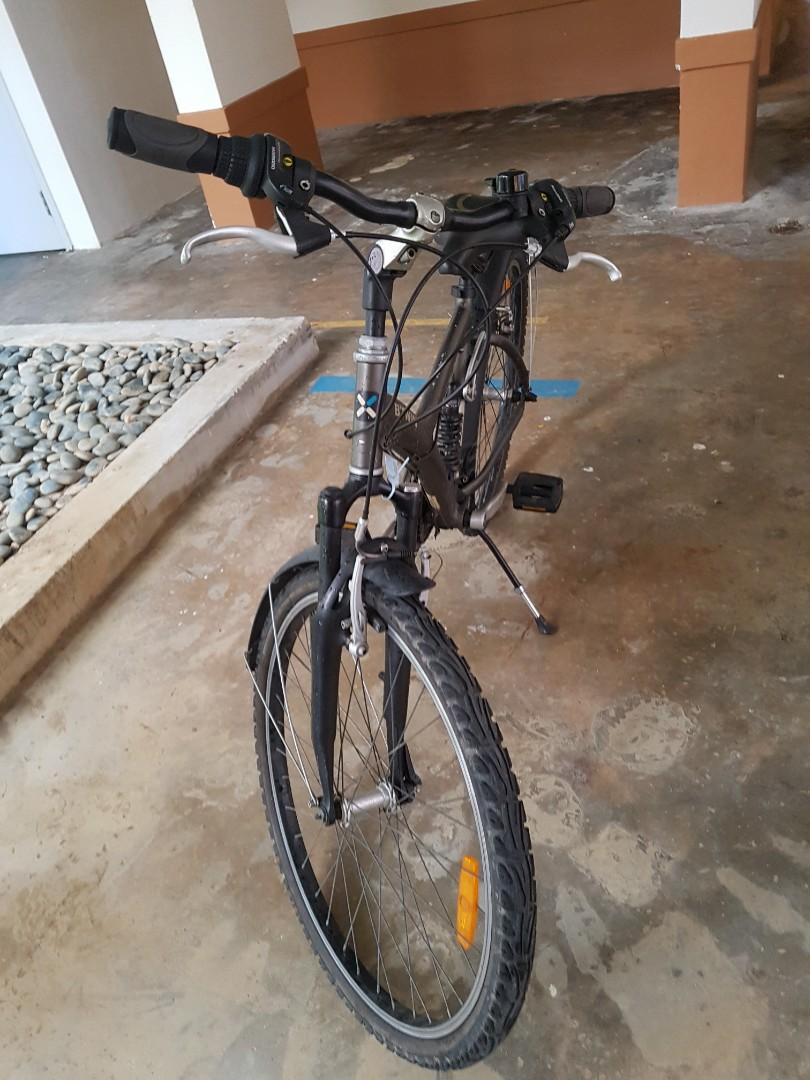 Btwin original 700 hybrid bike price on sale