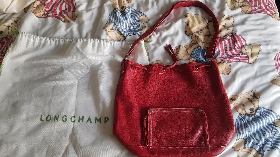 Longchamp bucket bag (Category: Luxury Bags & Wallets) located in Manila. Submitted by cicada15 (Listing ID 1122398039, Image 2). Description: High quality leather used once stire bought for 24k (Rustans).