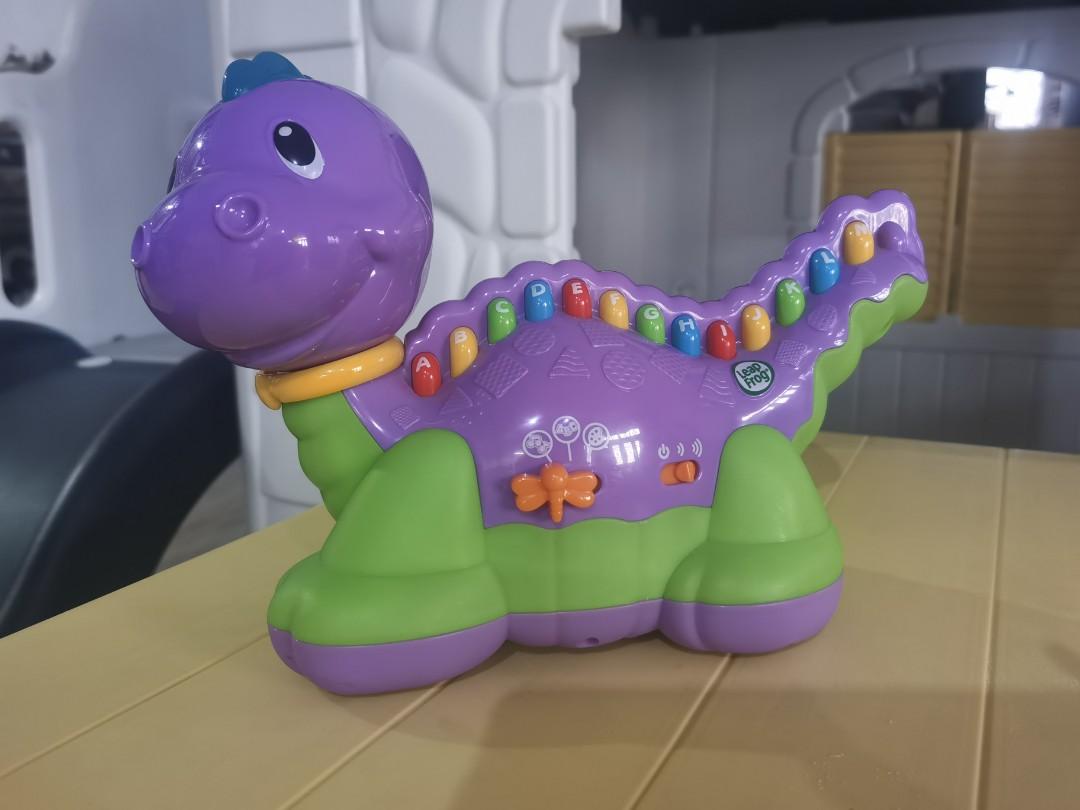 Leapfrog Lettersaurus (Category: Educational & Learning Toys) located in Manila. Submitted by rohan2017 (Listing ID 1117307934, Image 1). Description: Leapfrog Lettersaurus Purple Musical Alphabet Dinosaur Preloved Toy‼️ Brand: LeapFrog Learning Line: Lettersaurus Color: Purple Pattern Solid Features: Buttons, Lights, Music, Sound, Alphabet, ABC's, Colors.