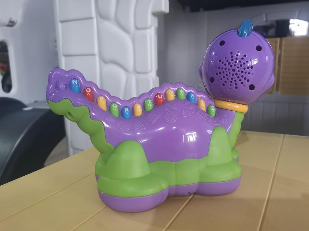 Leapfrog Lettersaurus (Category: Educational & Learning Toys) located in Manila. Submitted by rohan2017 (Listing ID 1117307934, Image 2). Description: Leapfrog Lettersaurus Purple Musical Alphabet Dinosaur Preloved Toy‼️ Brand: LeapFrog Learning Line: Lettersaurus Color: Purple Pattern Solid Features: Buttons, Lights, Music, Sound, Alphabet, ABC's, Colors.