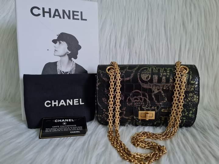 Chanel 2.55 Reissue Graffiti Print 224 (Category: Luxury Bags & Wallets) located in Manila. Submitted by bagislifeshop (Listing ID 1122728854, Image 2). Description: ▪️CHANEL 2.55 Reissue Graffiti Print 224▪️ ☑️Available in Manila ✅💯% authentic ✅ Series: 28 ✅Material: croc embossed leather in gold bijoux chain ✅Condition: 9.5/10 ✅Inclusions: with dustbag and authenticity card.
