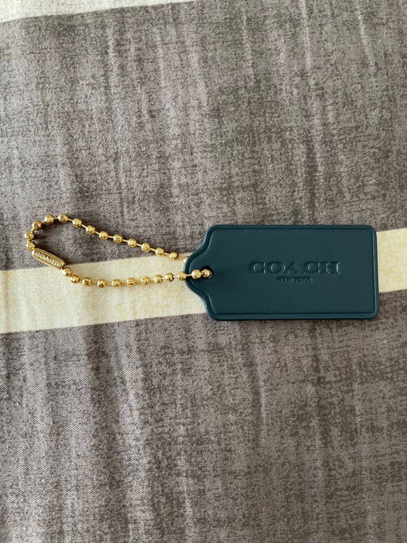 Coach dog tag top