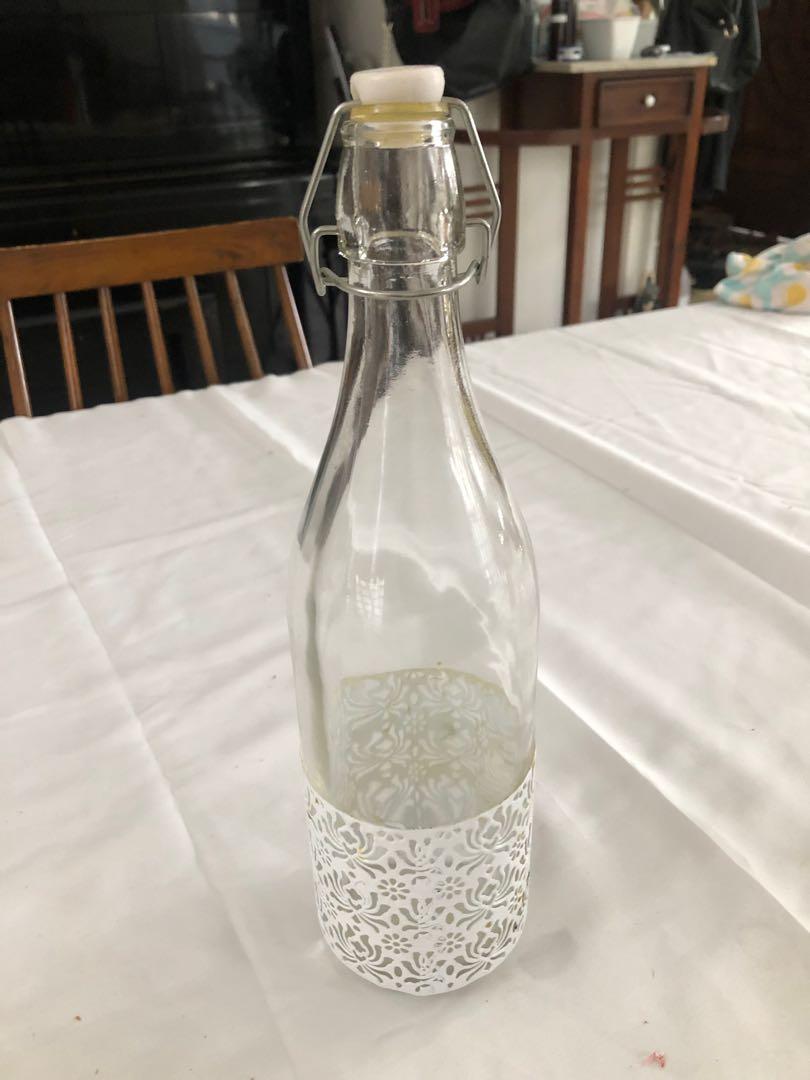 Glass Milk Bottles with Seal (Category: Pitchers & Dispensers) located in Manila. Submitted by lts125 (Listing ID 1122619542, Image 2). Description: Store milk fresh and spill-free with these milk bottles with silicon sealer. 4 have cow design, 1 with intricate white design. .
