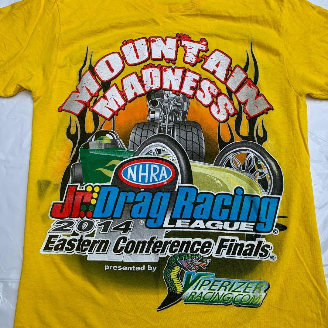 PO AOP F&B NHRA CAR RACING MOUNTAIN MADNESS JR DRAG RACING 2014 YELLOW T SHIRT SMALL UNISEX (Category: Tshirts & Polo Shirts ) located in Muntinlupa City. Submitted by roxclothing (Listing ID 1122599358, Image 2). Description: Issues: There is a black mark in the front near in the right side of the shirt. Please see all the attached photos and check the exact measurements for the correct size. Thank you .