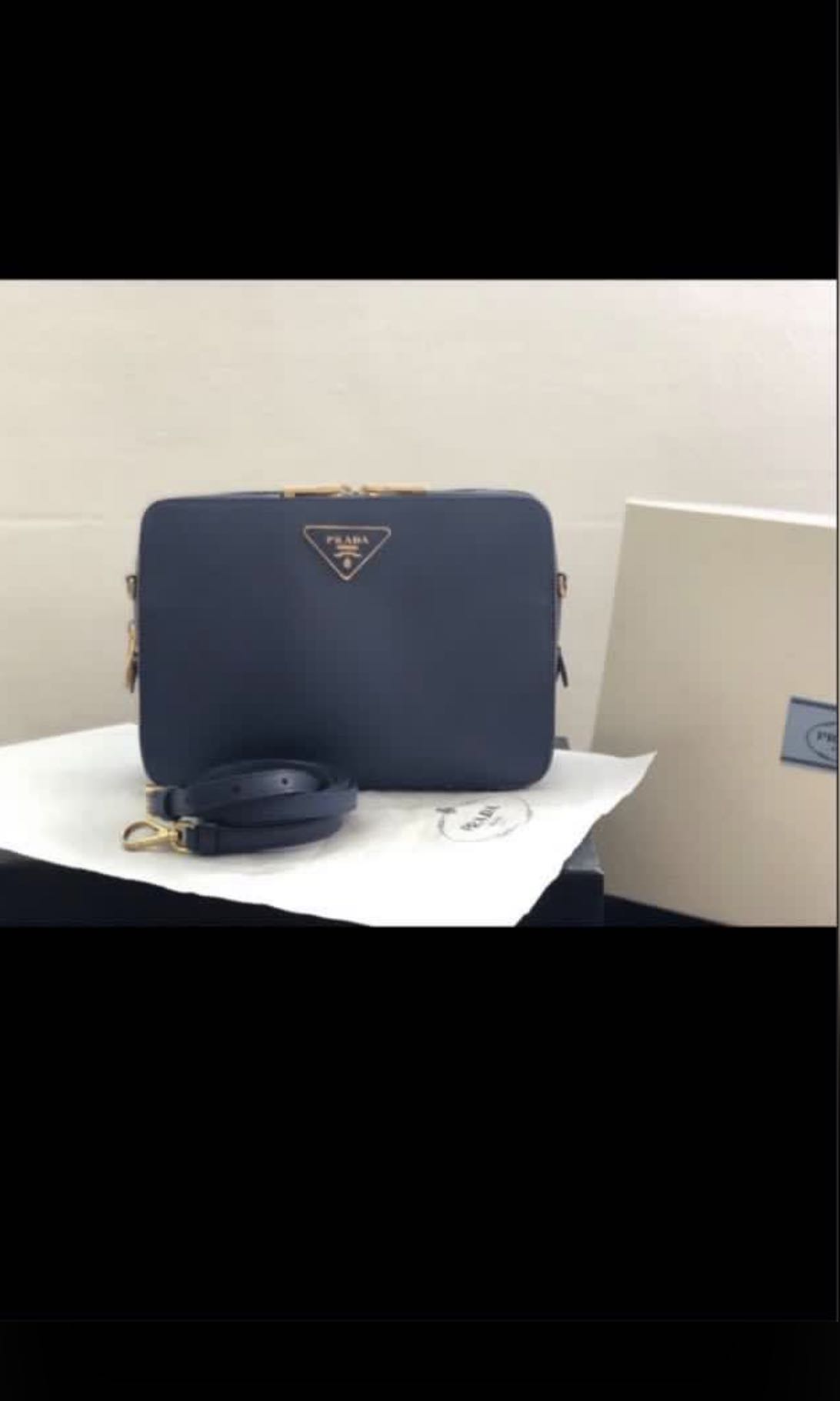 prada blue sling bag