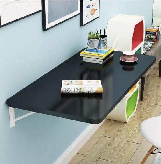 Wall Table (Category: Tables & Sets) located in Singapore. Submitted by colourfulife (Listing ID 1122655345, Image 2). Description: Black Foldable Table. Can use in d kitchen or study room. Save spacing! Measurement 60 X 40 CM.