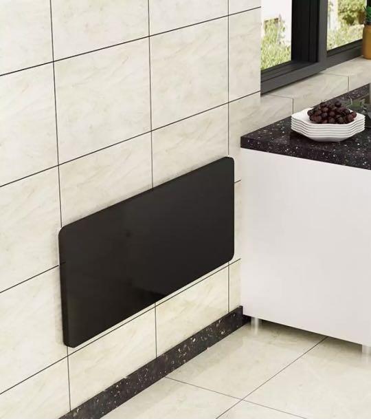 Wall Table (Category: Tables & Sets) located in Singapore. Submitted by colourfulife (Listing ID 1122655345, Image 3). Description: Black Foldable Table. Can use in d kitchen or study room. Save spacing! Measurement 60 X 40 CM.