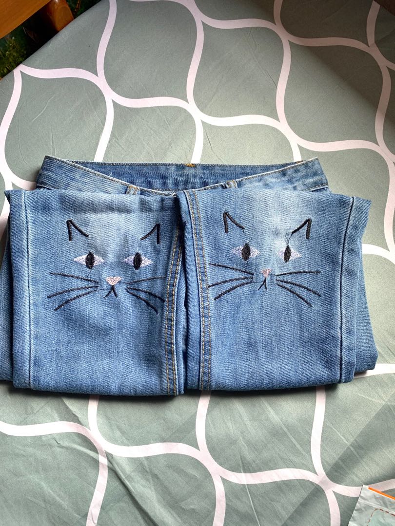 cat jeans, Women's Fashion, Clothes, Bottoms on Carousell