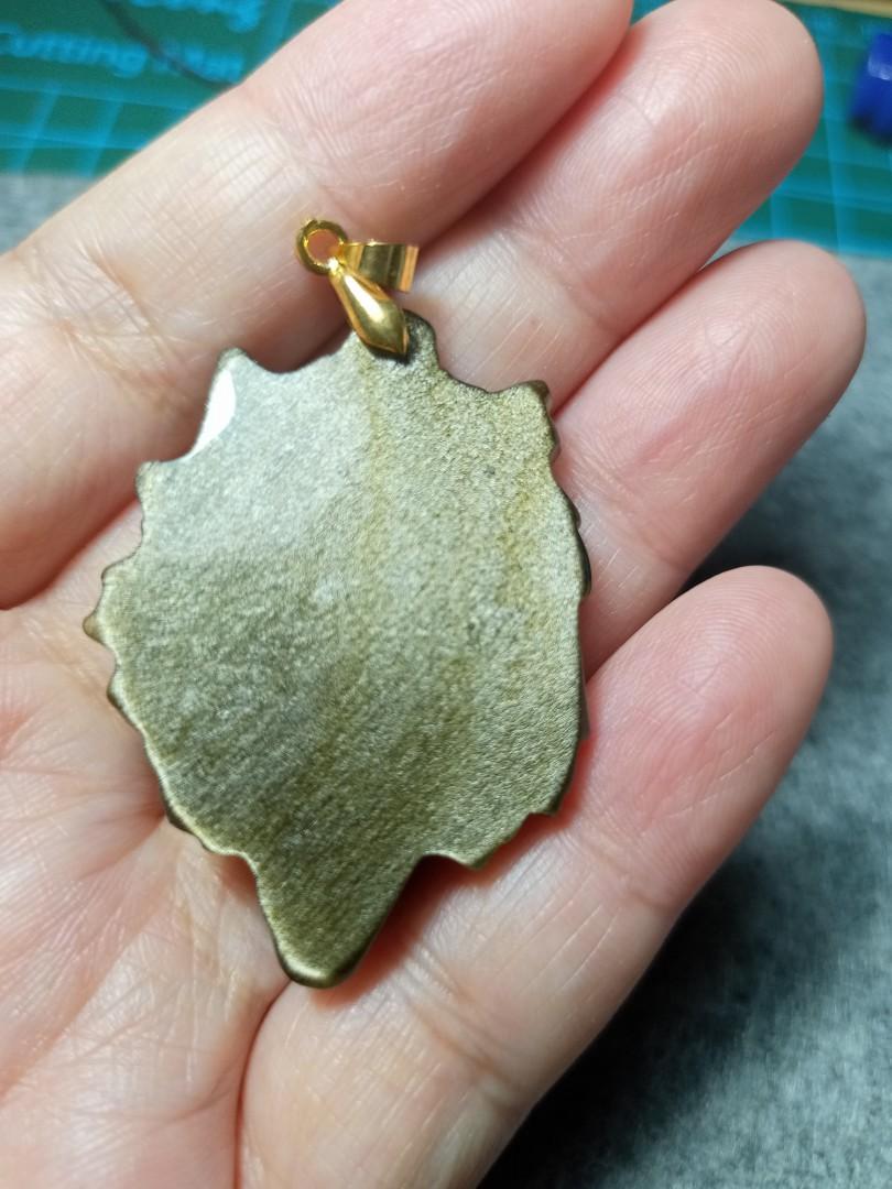 Golden Obsidian Carved Wolf Pendant (Category: Jewelry) located in Baguio. Submitted by heartedfinds (Listing ID 1122763768, Image 2). Description: about 42x32mm size very nice golden flash.