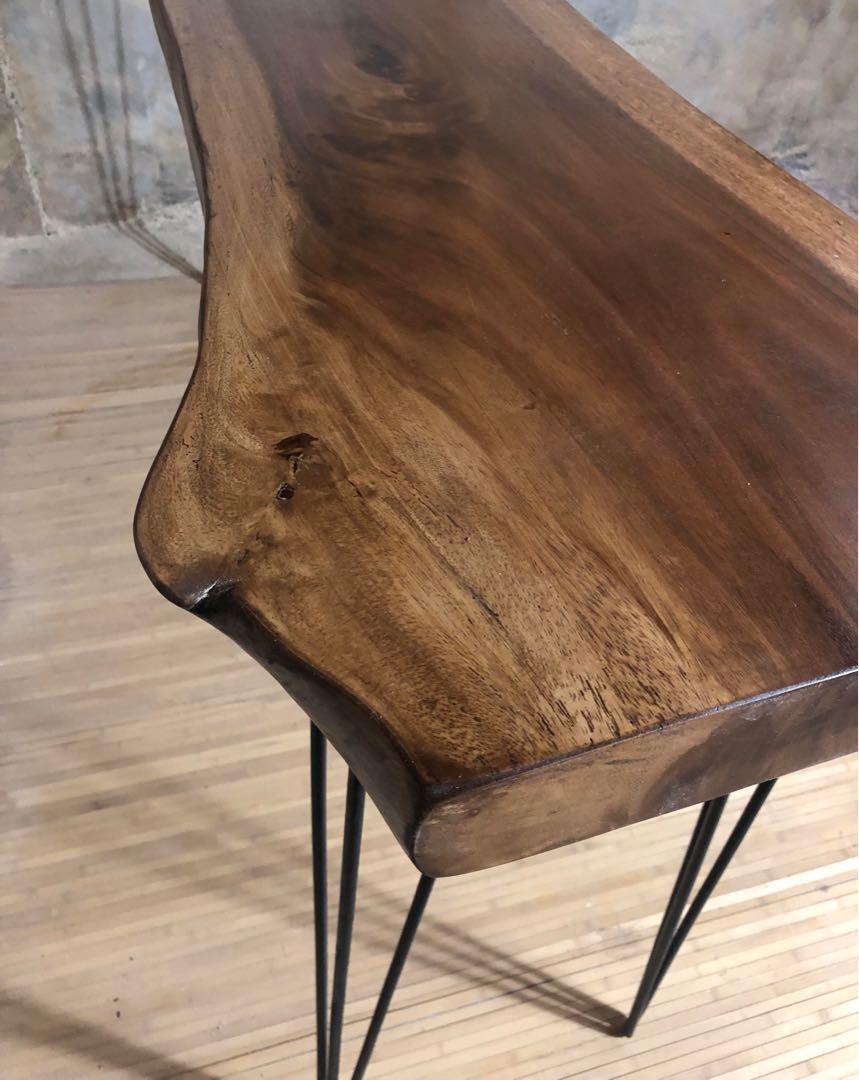 Live-Edge Acacia Bar Table Set (Category: Tables & Sets) located in Pasig City. Submitted by holzph (Listing ID 1122824647, Image 3). Description: This live-edge Acacia slab bar table set is perfect for three! Ideally for kitchen or co-working use, this slab table adds a modern rustic look to any part of your home. 🏡 Measurements: Length: 190cm / 6’3” Width: 42-50cm / 16.5-19.5” Height: 112cm / 44” Thickness: 6cm / 2.5” . . 100% Solid Acacia Woo
