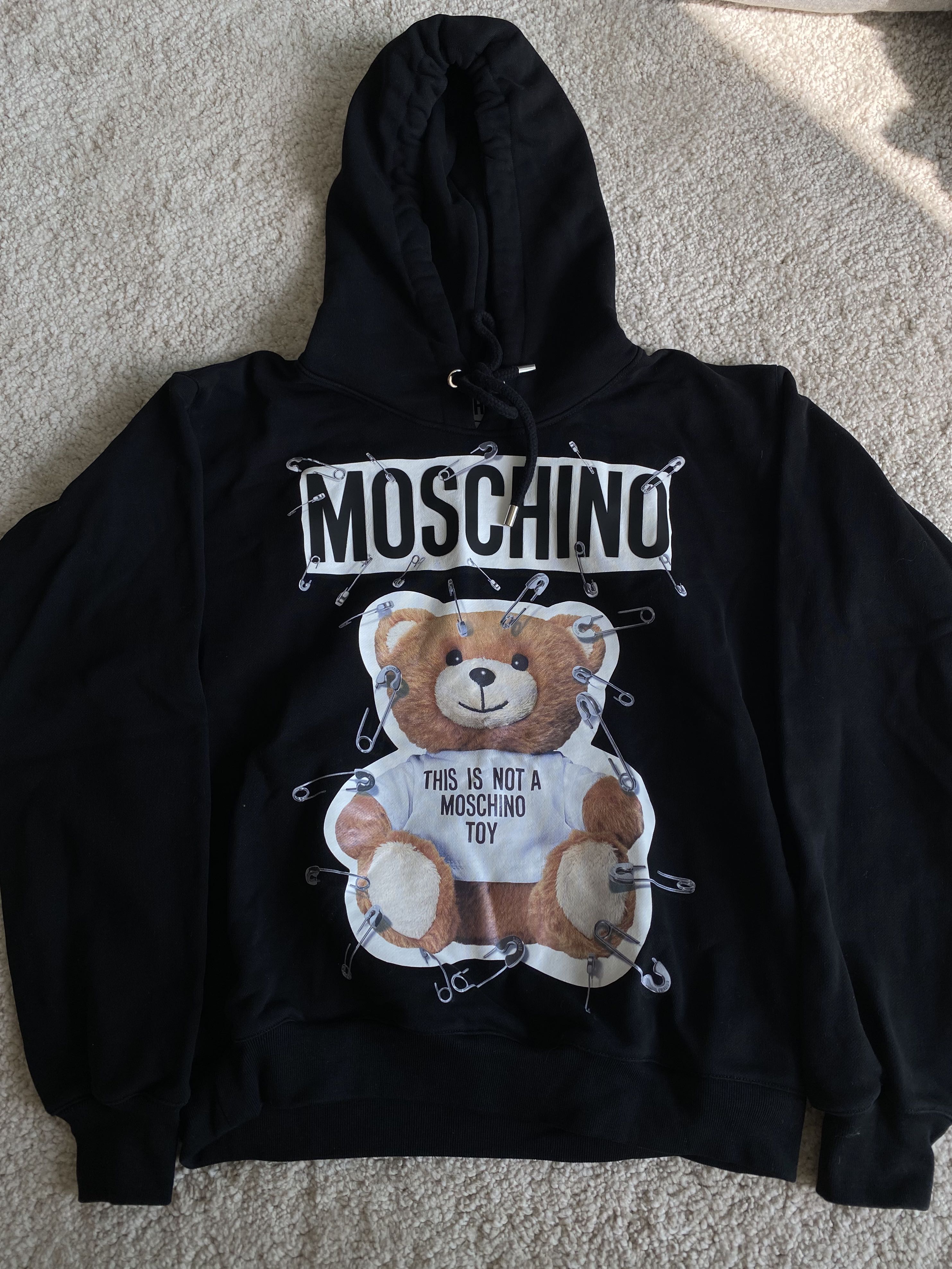 This is not a moschino toy hoodie cheap