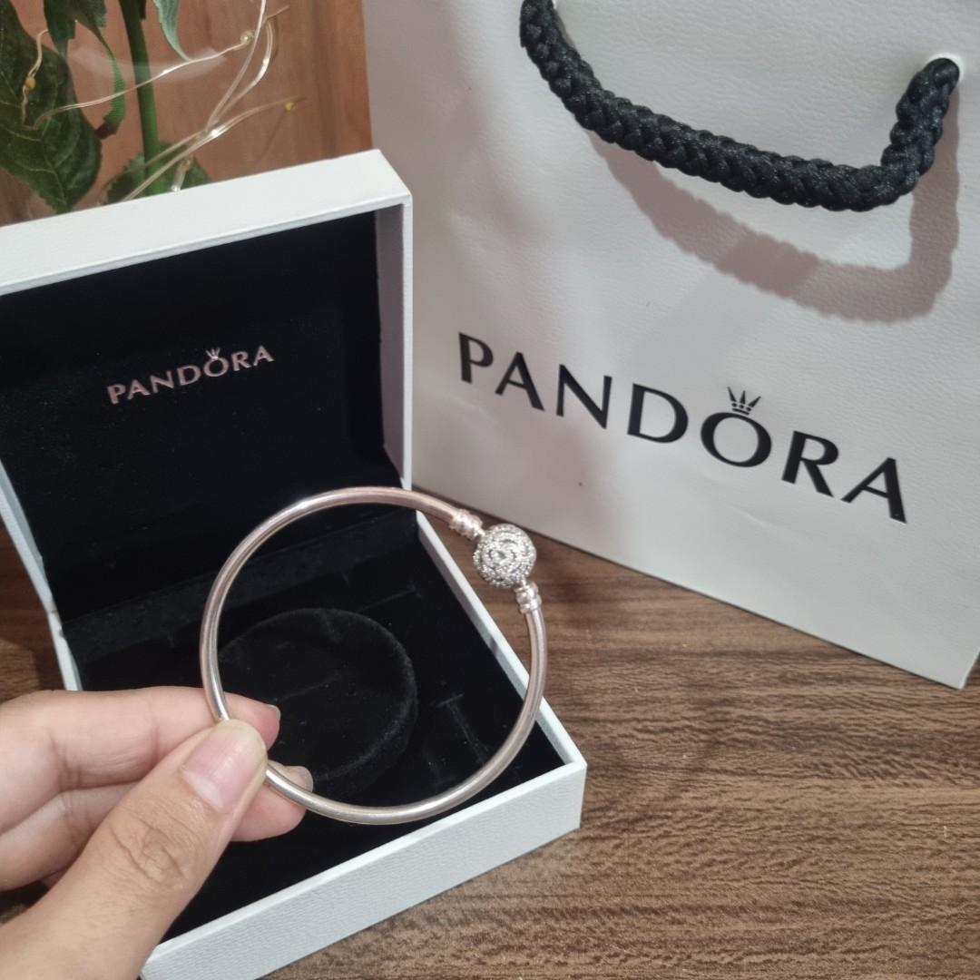 Pandora Beauty and the Beast Bangle, 17cm (Category: Bracelets) located in Dasmarinas. Submitted by asgoodfinds (Listing ID 1122778698, Image 3). Description: With bag, box, ribbon, and thank you card 99% smoothness, no oxidation RFS medyo masikip na lalo pag may charms.