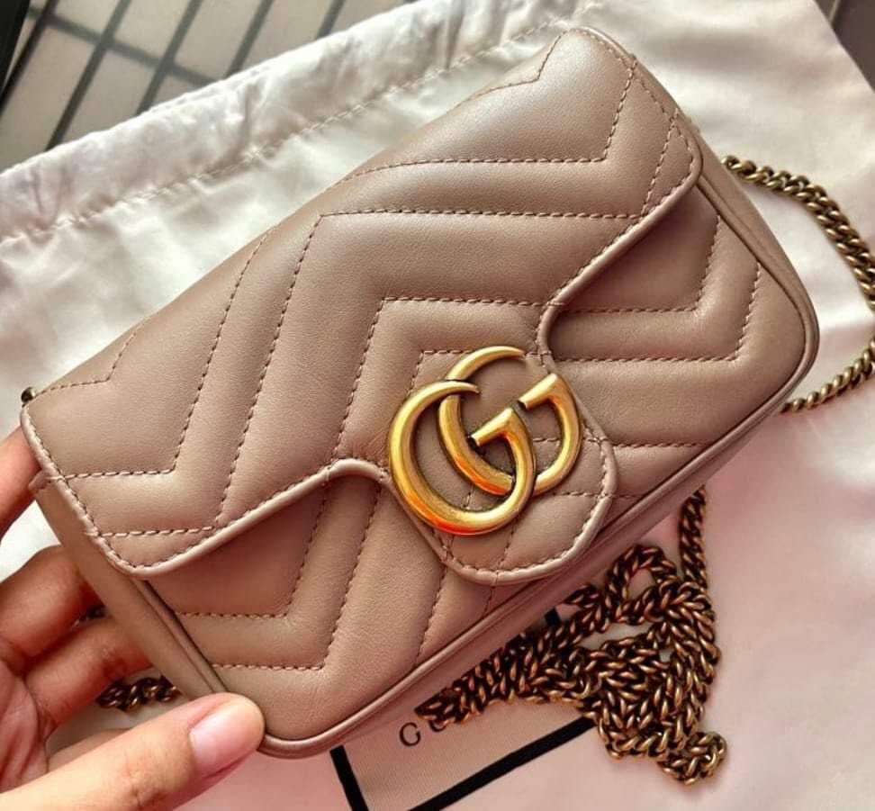 I am obsessed with this Gucci Marmont Super Mini in Dusty Pink. I