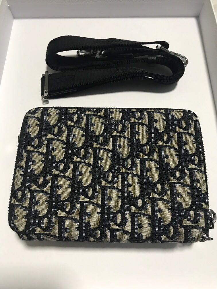 Authentic Dior Oblique Jacquard Vertical Lock Pouch with Strap, Luxury, Bags  & Wallets on Carousell