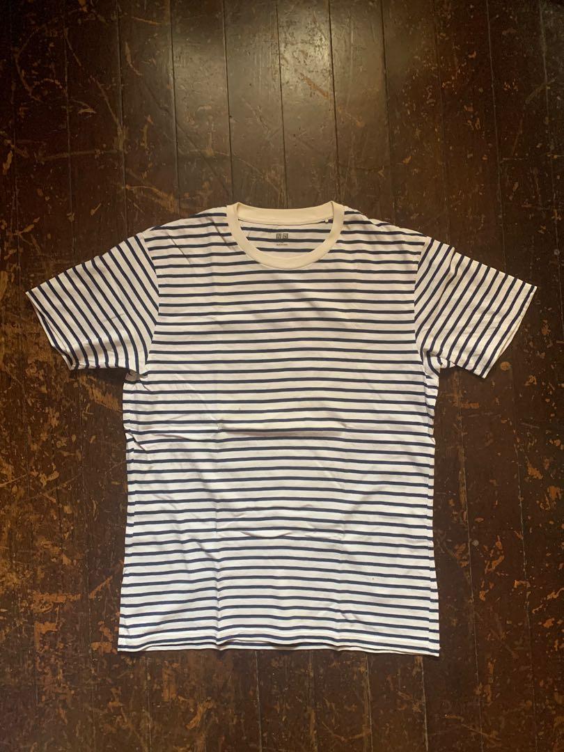 Uniqlo Striped Tee (Navy) (Category: Tshirts & Polo Shirts ) located in Quezon City. Submitted by _pbmt (Listing ID 1117488036, Image 1). Description: Has 2 small stains on the front as seen in the pics. - 20x27 - sleeves: 7.5 - shoulders: 17 MOPs: BPI/Gcash ✌🏽😬.