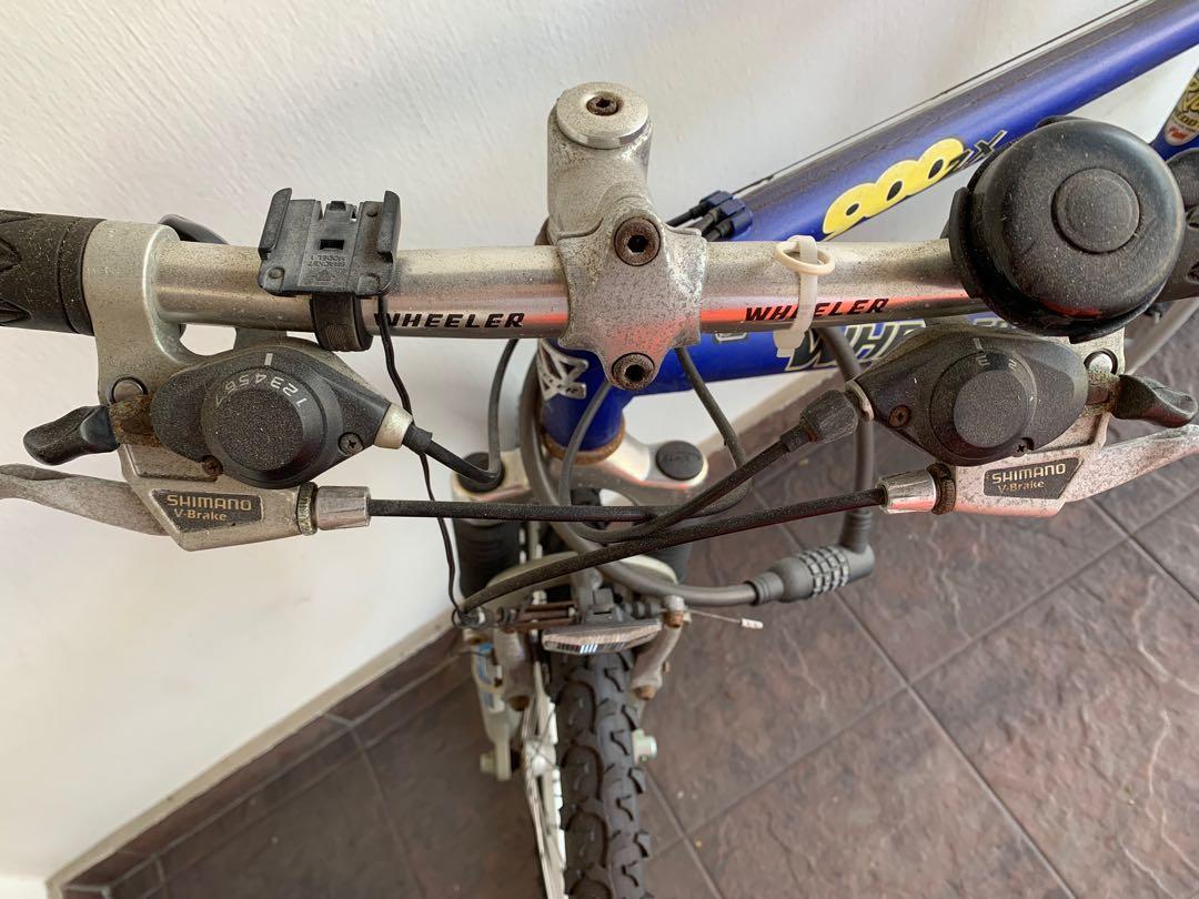 Wheeler 900ZX mountain bike with light speedometer tyre pump and bottle holder