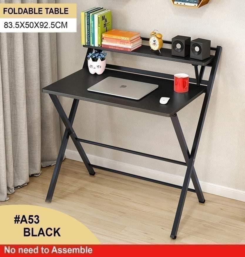 FOLDABLE STUDY TABLE (Category: Tables & Sets) located in Malabon City. Submitted by mhegz.25 (Listing ID 1117631442, Image 2). Description: ITS EASY TO USE NO NEED TO ASSEMBLE MADE OF MDF WOOD AND METAL FRAME FOLDED TABLE.