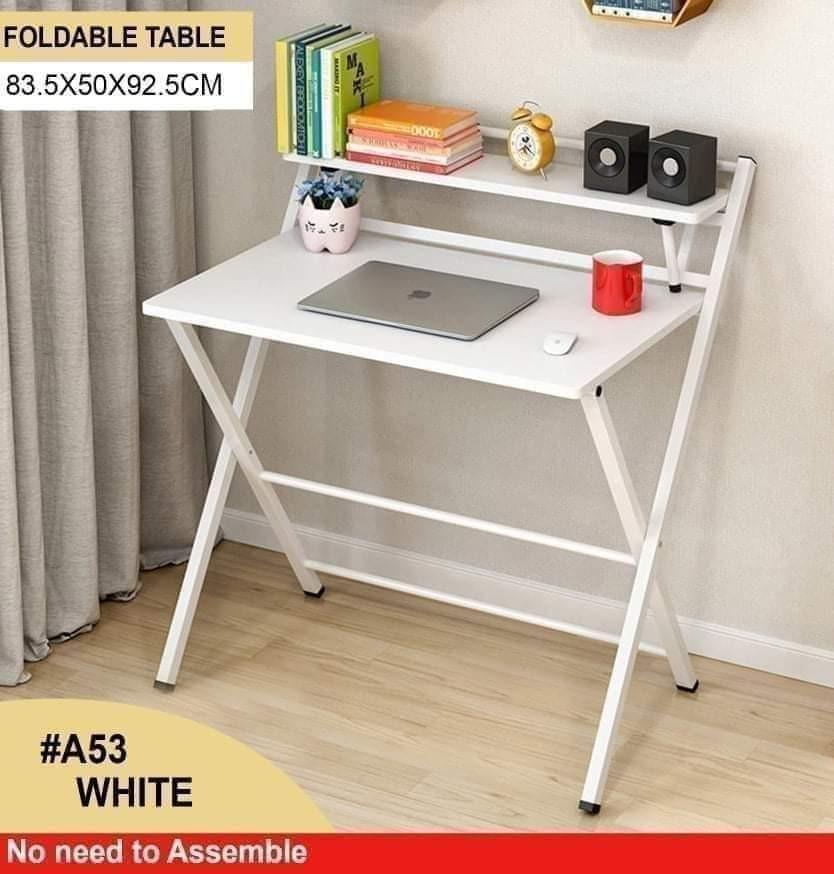 FOLDABLE STUDY TABLE (Category: Tables & Sets) located in Malabon City. Submitted by mhegz.25 (Listing ID 1117631442, Image 3). Description: ITS EASY TO USE NO NEED TO ASSEMBLE MADE OF MDF WOOD AND METAL FRAME FOLDED TABLE.