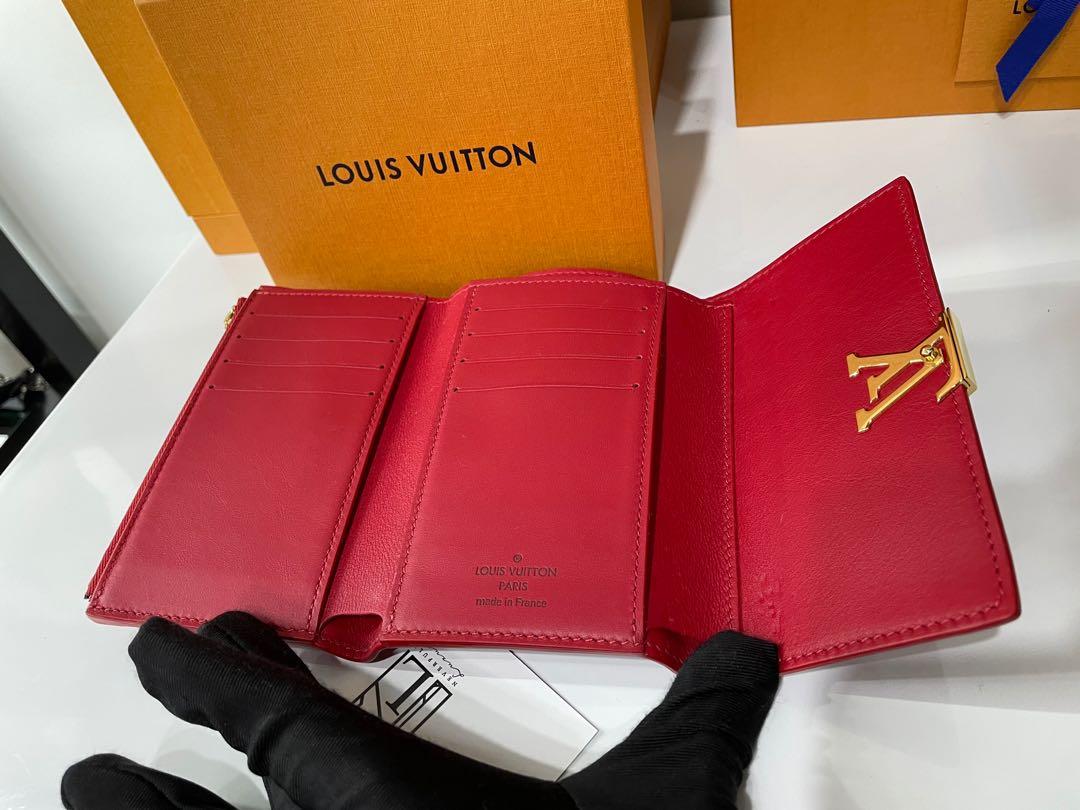 Louis Vuitton® Capucines Compact Wallet Scarlet. Size