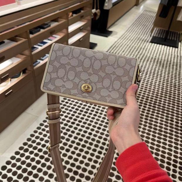 Hayden foldover crossbody clutch in signature canvas sale