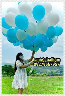 light blue/white helium balloon