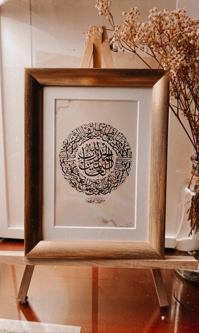 Ready Made Frames/Customisable Frames (Category: Handmade Craft) located in Singapore. Submitted by dacoolkid (Listing ID 1116843799, Image 3). Description: Customisable frames for sale. Perfect for birthday gifts, graduation gifts! Gold frame (A5) Choice of Design 1. Surah (Al Fatihah, Ayat Kursi Any surah) 2. Any wordings/Name 3. Customisation All will be wrapped in a brown packaging or transparent bag (subject to availability). • Additional $5