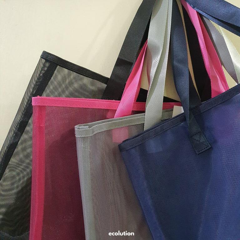 Multipurpose Mesh Tote Bag Beach Pet Shoulder (Category: Tote Bags) located in Manila. Submitted by ecolutionph (Listing ID 1118321989, Image 3). Description: - Multipurpose bag - Material: mesh nylon & cotton straps - Size: --> Width: 36cm --> Length: 43cm --> Base Width: 15cm --> Base Length: 43cm --> Strap: 60cm - Design: hard mesh structure so bag does not collapse - Usage: --> Covid essential bag --> Daily bag --> Shopping bag --> Grocery ba