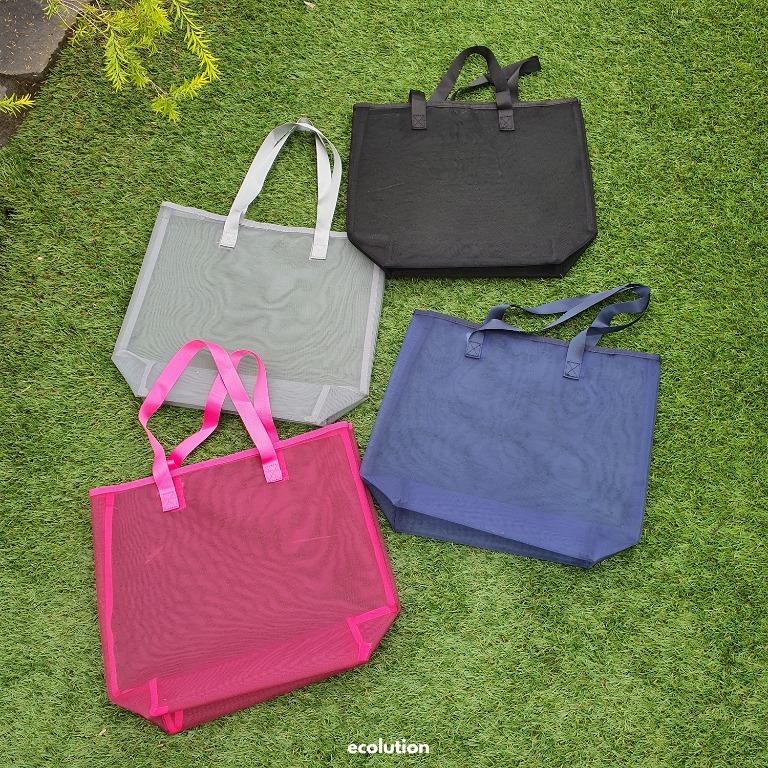 Multipurpose Mesh Tote Bag Beach Pet Shoulder (Category: Tote Bags) located in Manila. Submitted by ecolutionph (Listing ID 1118321989, Image 1). Description: - Multipurpose bag - Material: mesh nylon & cotton straps - Size: --> Width: 36cm --> Length: 43cm --> Base Width: 15cm --> Base Length: 43cm --> Strap: 60cm - Design: hard mesh structure so bag does not collapse - Usage: --> Covid essential bag --> Daily bag --> Shopping bag --> Grocery ba