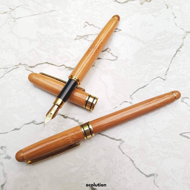 Wooden Fountain Pen (Category: Stationery & School Supplies) located in Manila. Submitted by ecolutionph (Listing ID 194810377, Image 1). Description: - Refillable wooden fountain pen - Writes very smoothly on paper - Pen material: peach wood & metal - Nib material: stainless steel - Refillable ink: piston style - Nib: 0.5mm * Since the exterior is made of natural bamboo, the color may vary from the picture time to time. Note: Pen does not come w