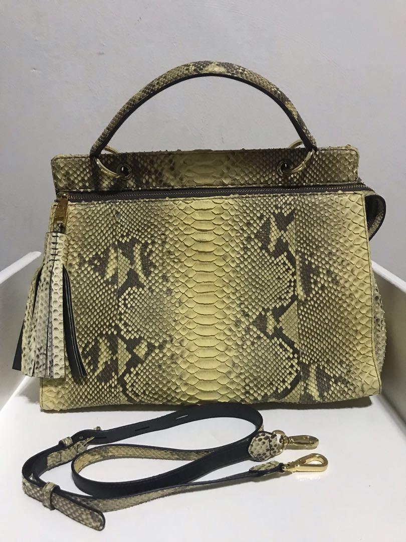 Zarmoi Genuine Python Skin (Category: Luxury Bags & Wallets) located in Valenzuela. Submitted by rebella.ph (Listing ID 1118257144, Image 1). Description: ‼️See the last picture of the flaw.‼️ Exotic snakeskins are delicate and sensitive to harsh light so it’s important to avoid UV and direct sunlight. Overexposure to the elements, hot and cold, will cause the skin to dry out and the scales to lift..
