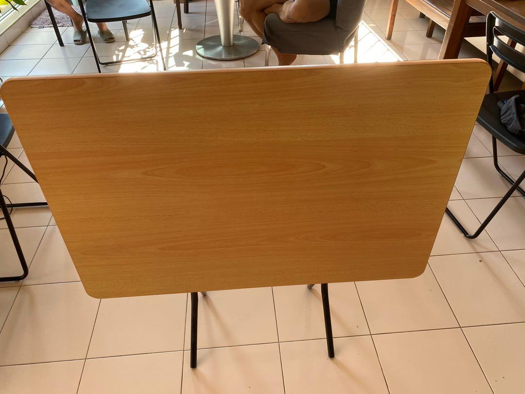 Foldable Table (Category: Tables & Sets) located in Singapore. Submitted by tanlady123 (Listing ID 1118393614, Image 2). Description: Rectangular foldable table hardly used maybe once or twice, kept in store room. Length 90 cm by width 61 cm. When folded, height is 92cm, spread at bottom legs is 29 cm. Self-collect at Blk 117, Bishan St 12. .