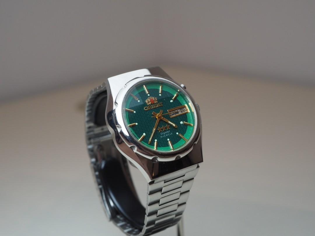 Orient tristar green best sale dial