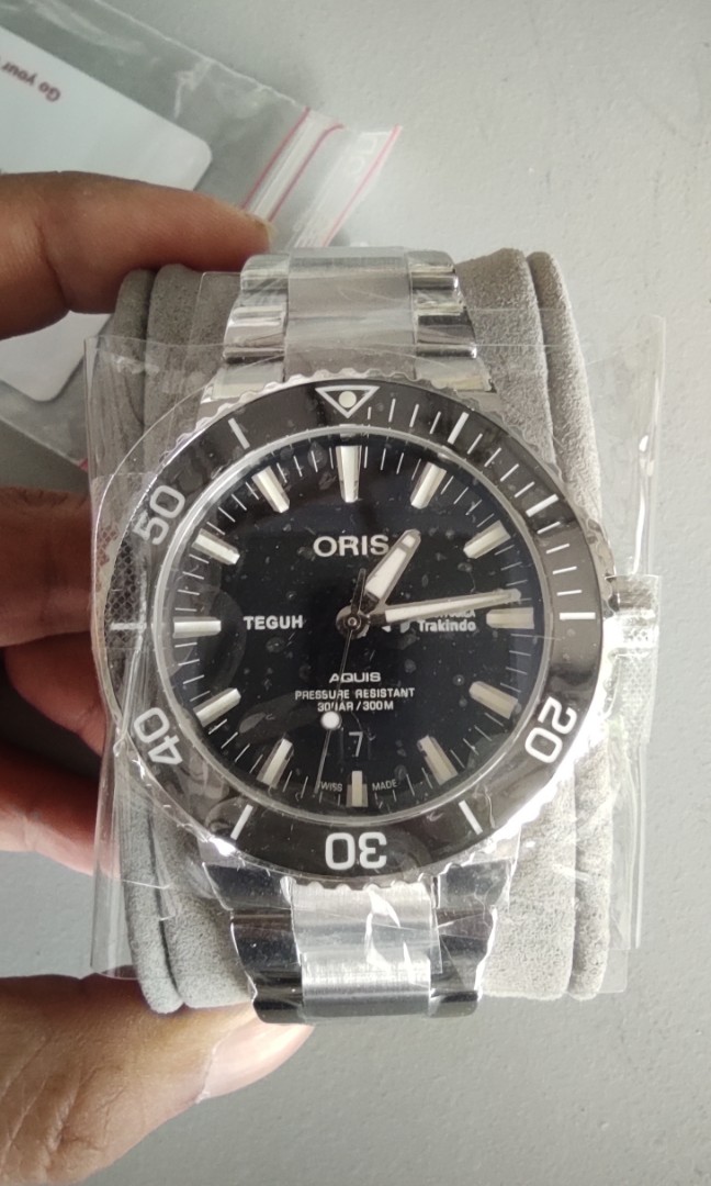 new oris aquis