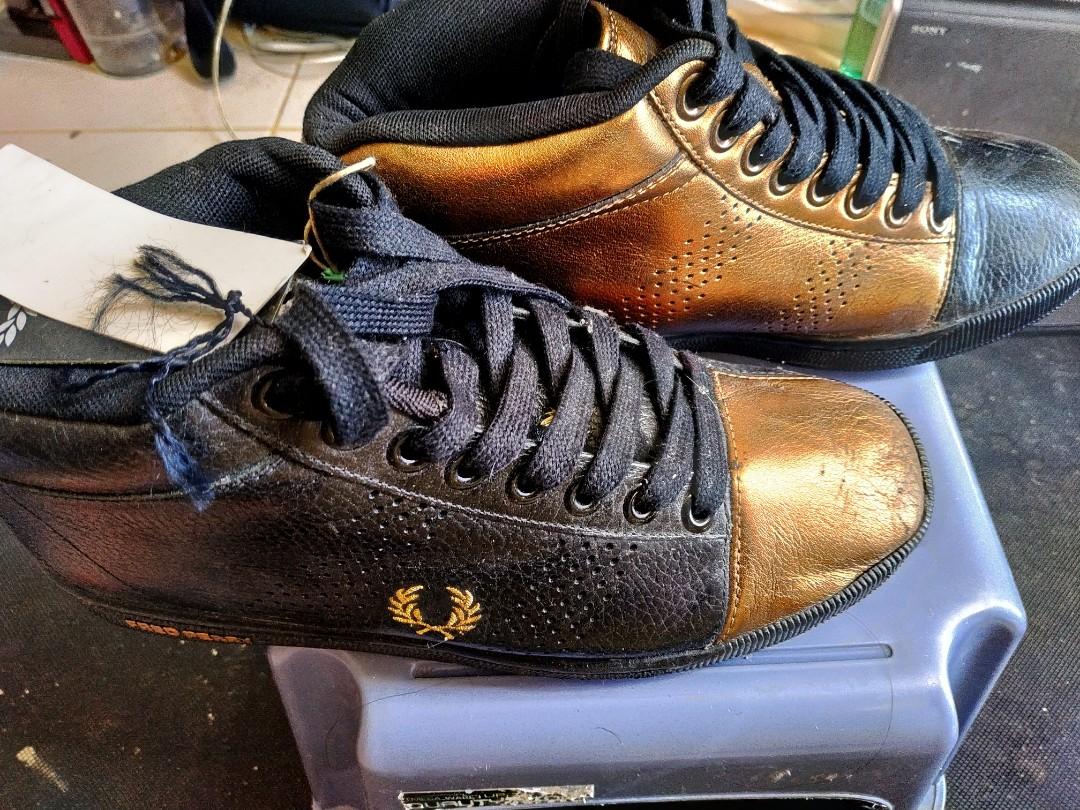 Raf Simons X Fred Perry Leather Sneakers (Category: Sneakers) located in Muntinlupa City. Submitted by silent_mute (Listing ID 1123017942, Image 1). Description: Please note some marks of the toe part. Gcash/BPI/BDO.