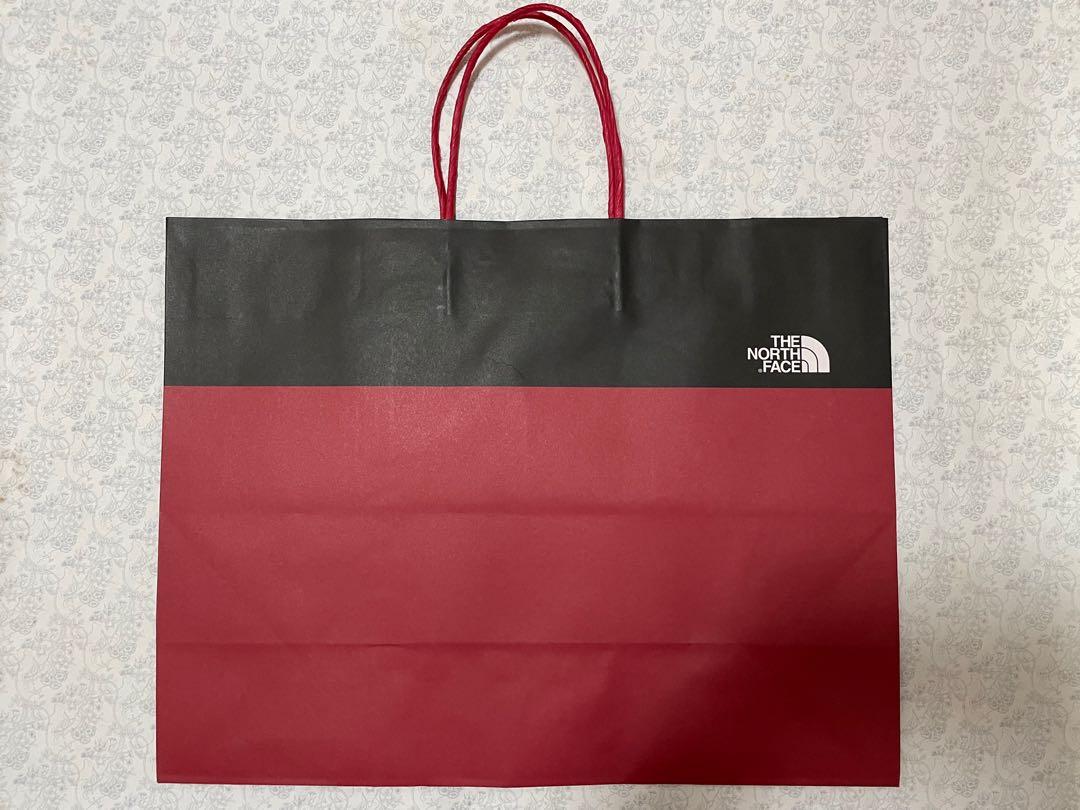 The North Face gift bag paper 紙袋, 男裝, 袋, 公事包- Carousell