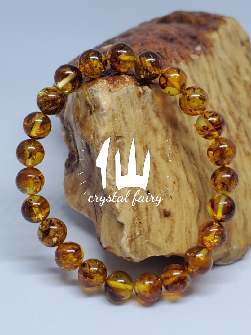 琥珀花珀8 2mm 黃金色還有裡面的紅鱗片不同角度發出不同靈光令人著迷 女裝 飾物及配件 寶石 鑽石 水晶 Carousell