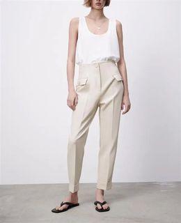 Beige fake pocket trousers