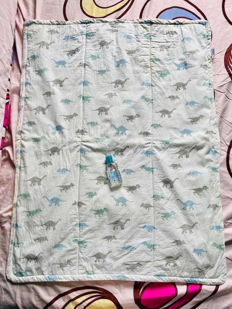 BLOOM beddings (rarely used) (Category: Children's Beds) located in Quezon City. Submitted by chizmax (Listing ID 1124879914, Image 3). Description: BLOOM BRAND. Soft and smooth, perfect for cribs and playpens. Can also be used as comforter. Rarely used but got yellow storage stains. (Pix with oil bottle for size perspective). .